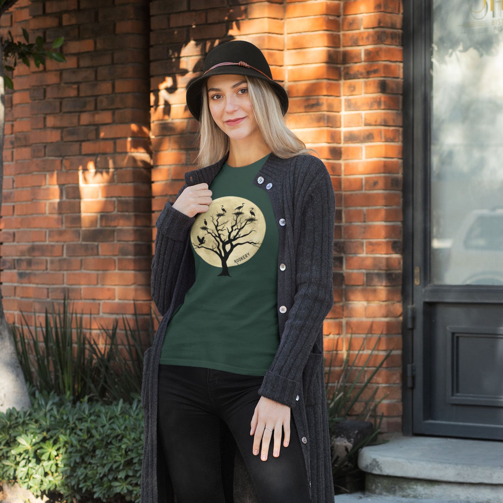 Green unisex bird shirt with a full moon outlining a heron rookery.
