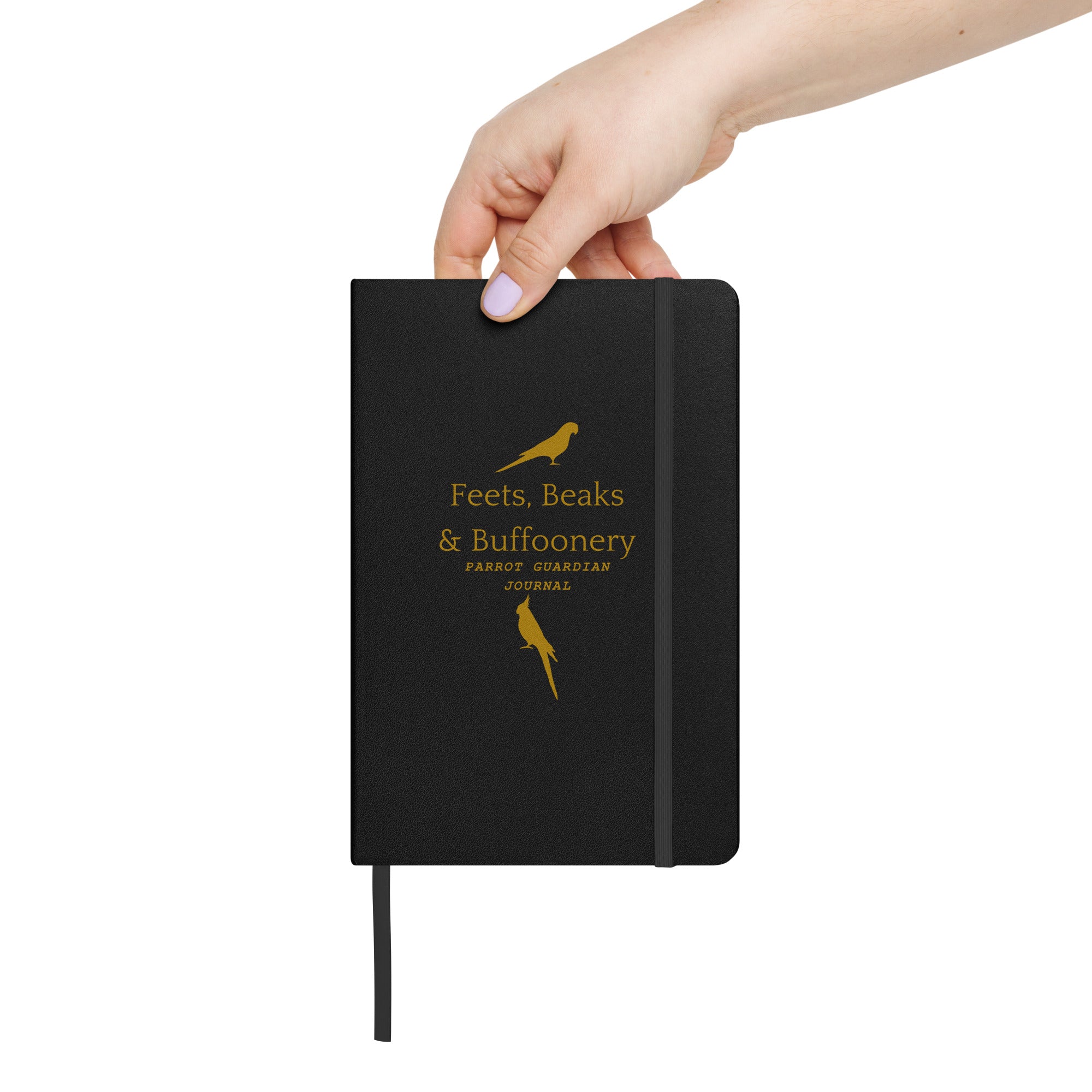 Hardcover bound notebook in black with the words, "Feets, Beaks & Buffoonery, Parrot Guardian Journal" on the front with outlines of parrots above and below. Held in a hand for scale.