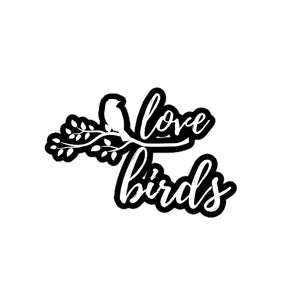 Sticker of a bird on a branch with the word "Love" above the branch and the word "birds" below the branch. 5 inch by 5 inch