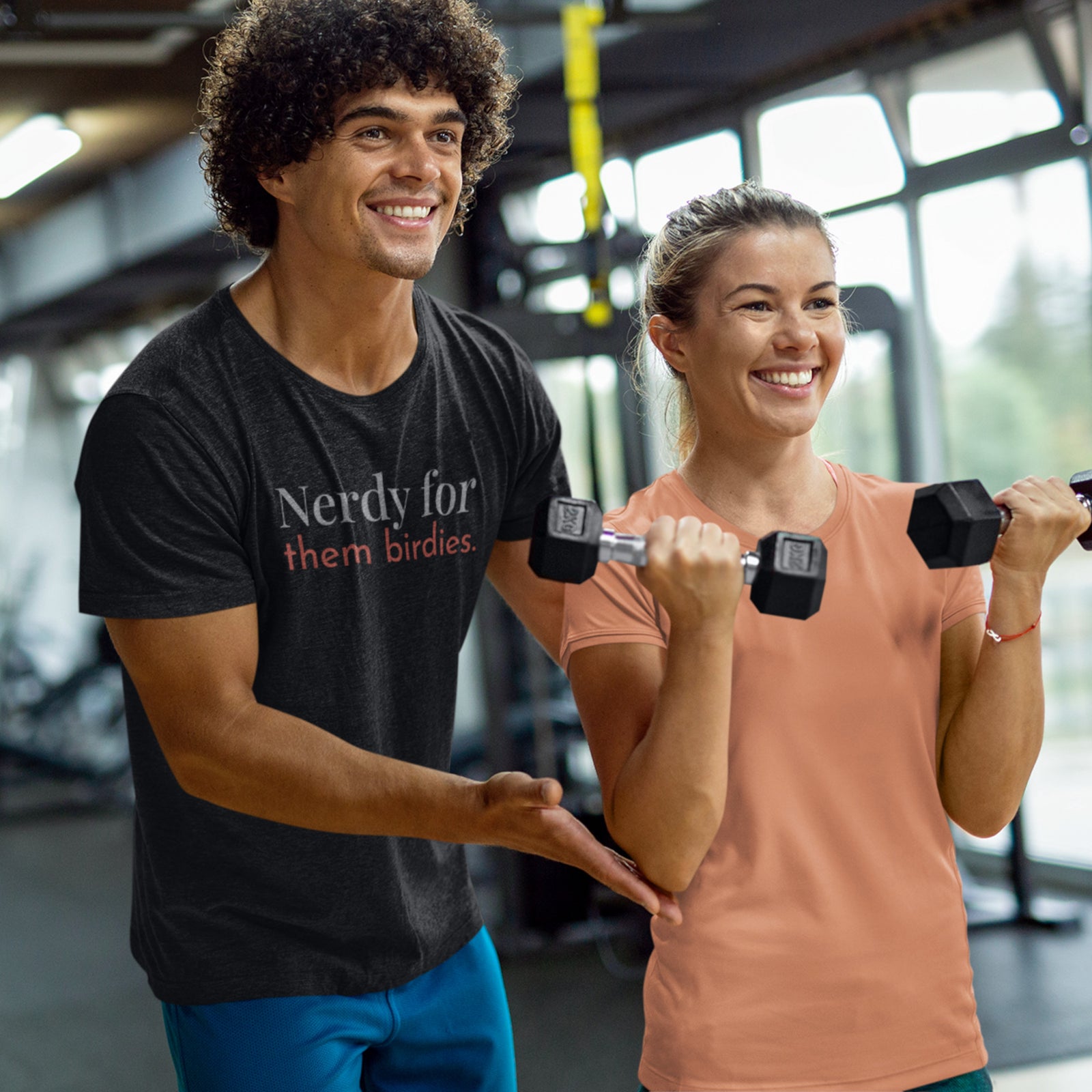 Black unisex bird shirt with the words Nerdy for them birdies on the front in two coordinating fonts and colors.
