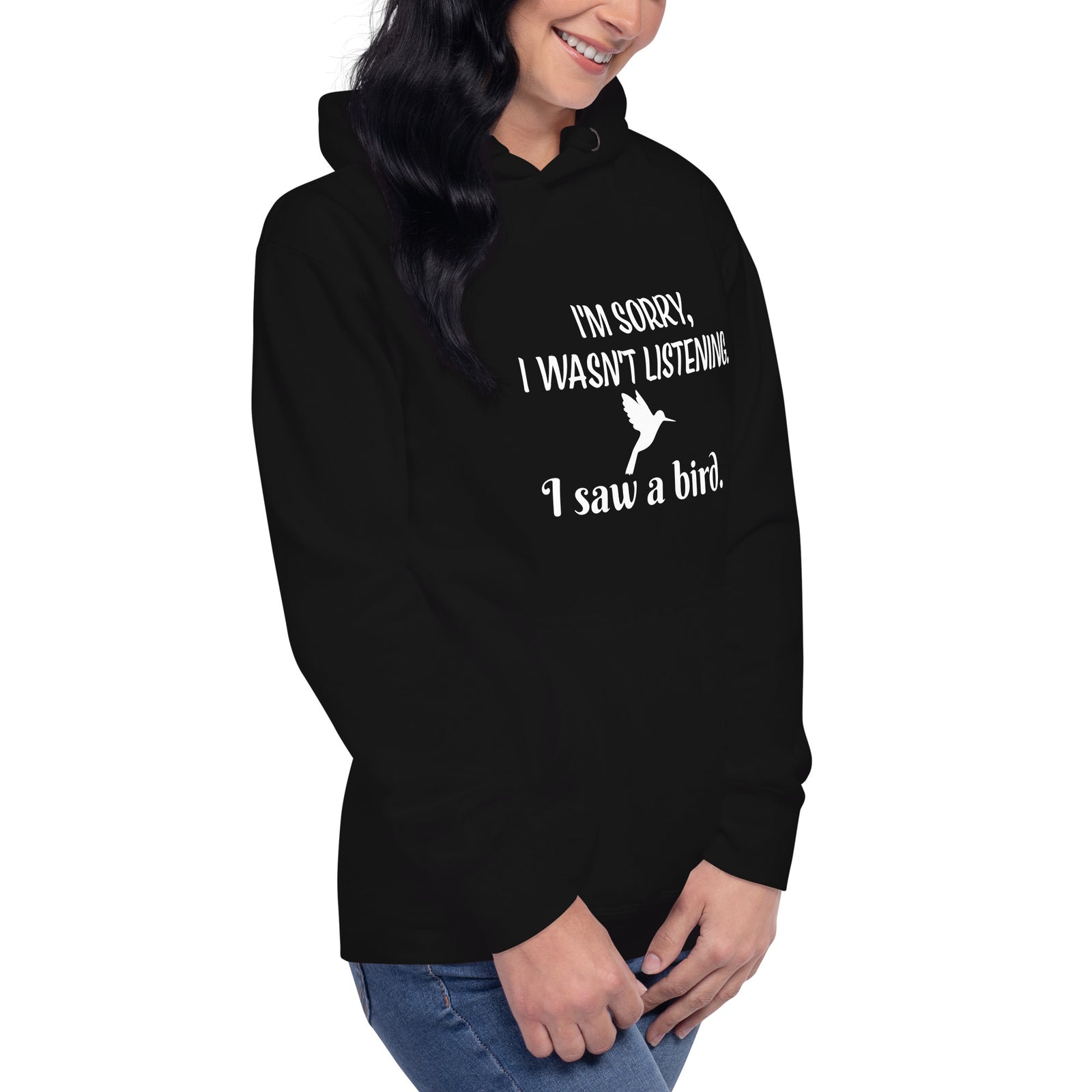Black bird hoodie with the words I'm sorry I wasn't listening, I saw a bird. And a graphic of a hummingbird flying.