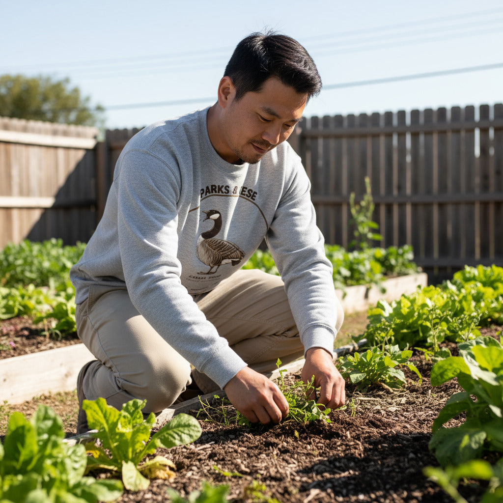 Unisex off-white bird sweatshirt with a canada goose on the front and a park department theme.