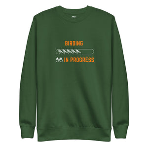 Forest green birding sweatshirt with the words Birding in Progress on the front around a loading progress bar.