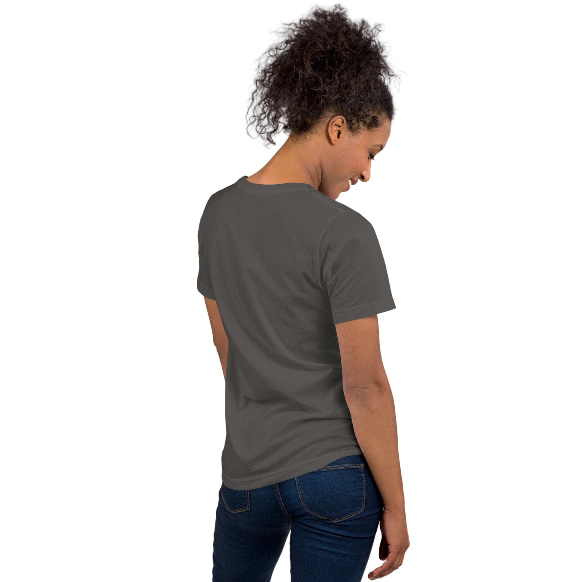 A dark gray bird shirt with the words, "Small. Fierce. Fluffy" below an illustration of an American Kestrel. Worn by a woman