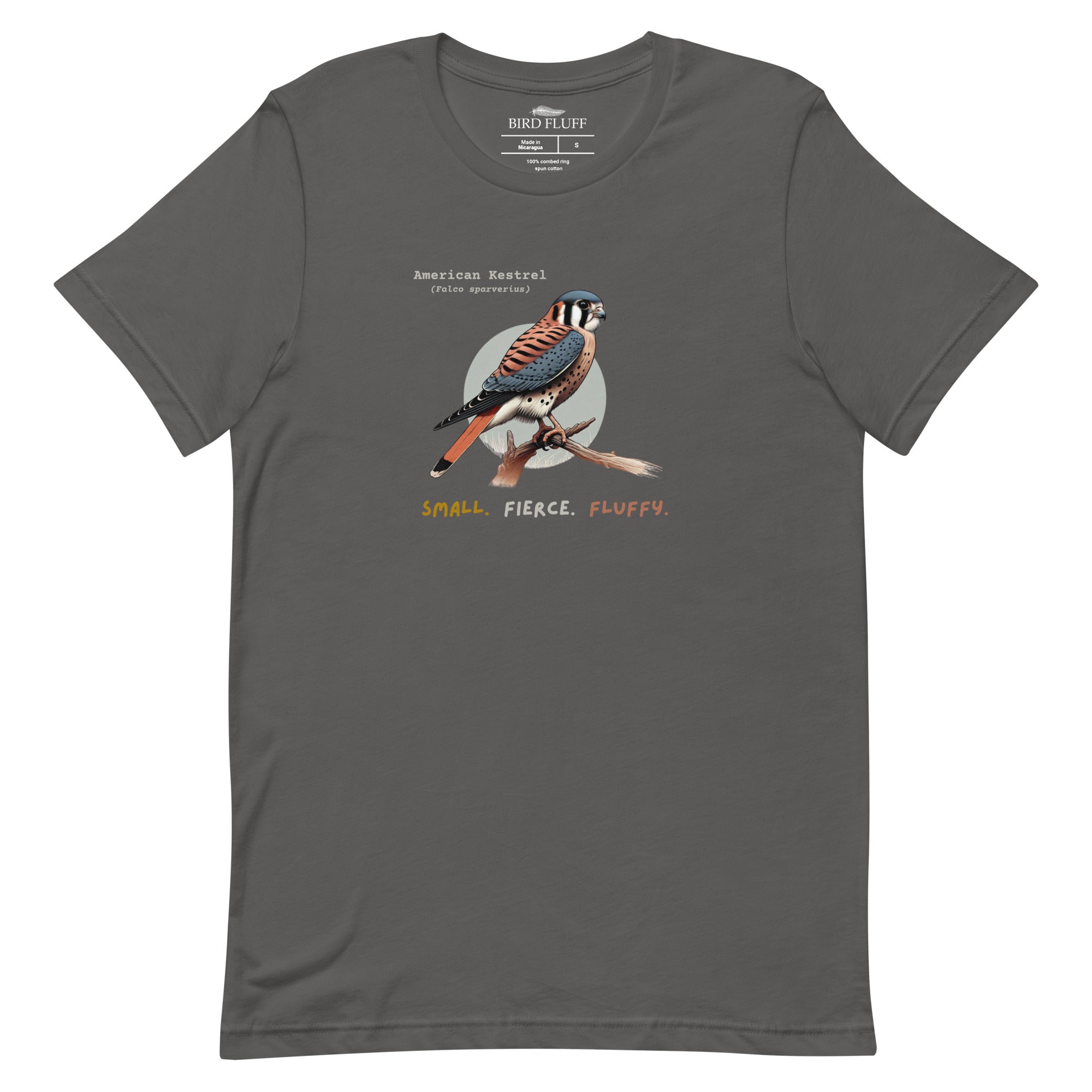 A dark gray bird shirt with the words, "Small. Fierce. Fluffy" below an illustration of an American Kestrel.