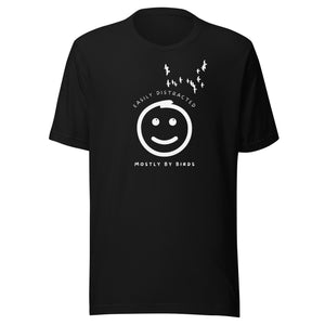 Black unisex bird t-shirt with a smiley face looking up and to the side at a flock of birds surrounded by the words, "Easily Distracted" above and, "Mostly by Birds" below.