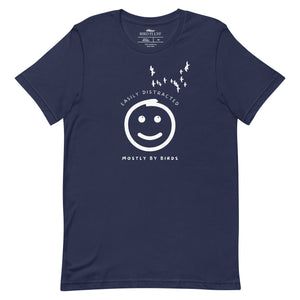 Navy blue unisex bird t-shirt with a smiley face looking up and to the side at a flock of birds surrounded by the words, "Easily Distracted" above and, "Mostly by Birds" below.