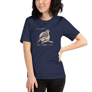 A navy blue bird shirt with the words, "Small. Fierce. Fluffy" below an illustration of an American Kestrel. Worn by a woman.