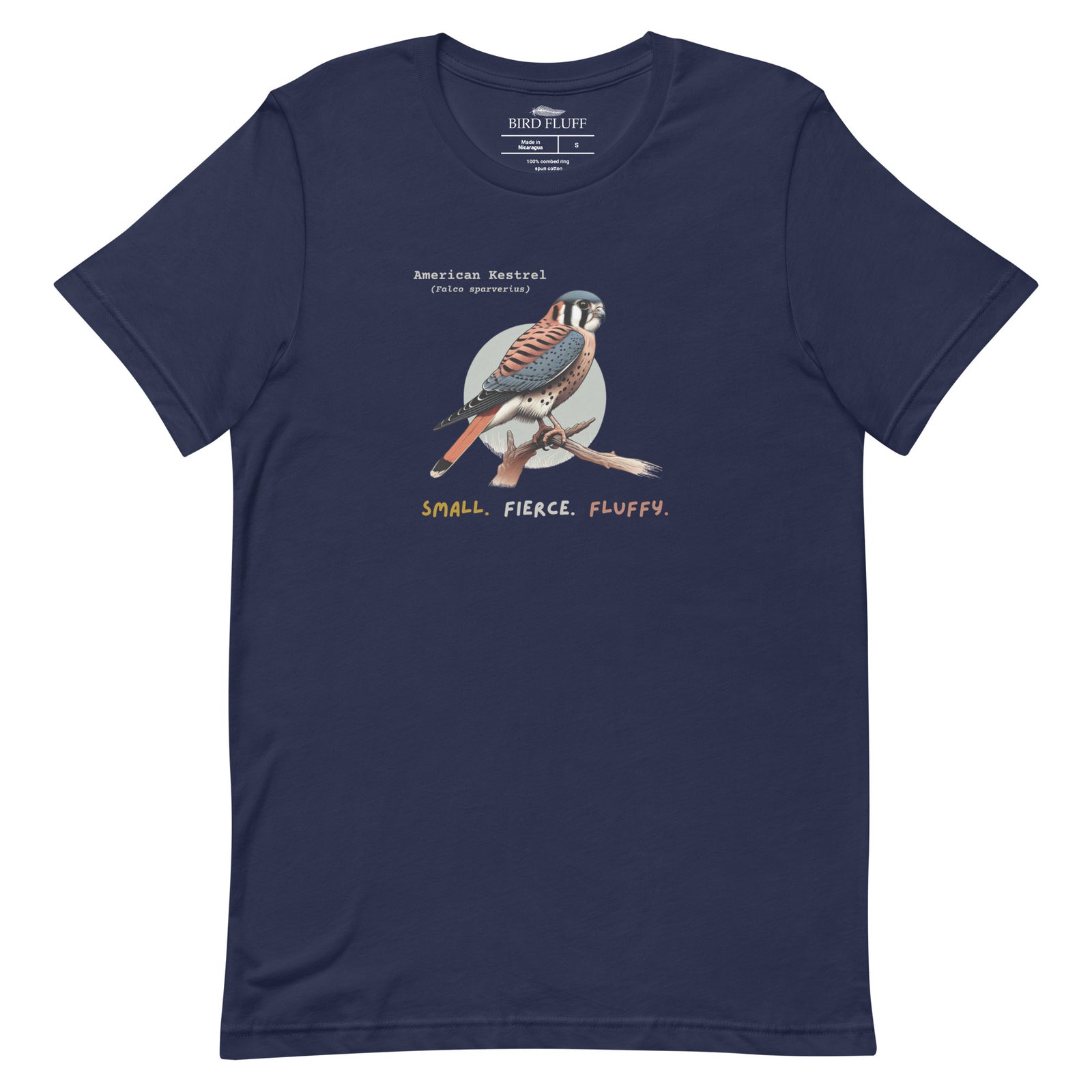 A navy blue bird shirt with the words, "Small. Fierce. Fluffy" below an illustration of an American Kestrel.