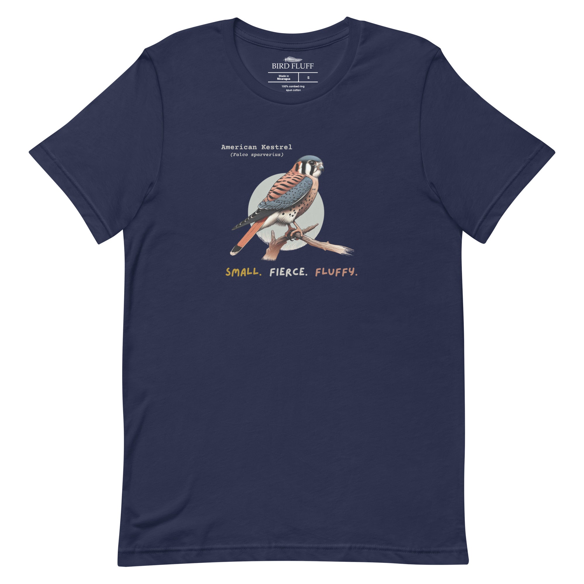 A navy blue bird shirt with the words, "Small. Fierce. Fluffy" below an illustration of an American Kestrel.