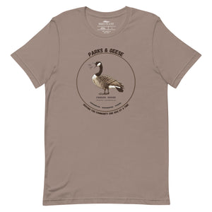 Unisex light tan bird shirt with a canada goose on the front and a park department theme.