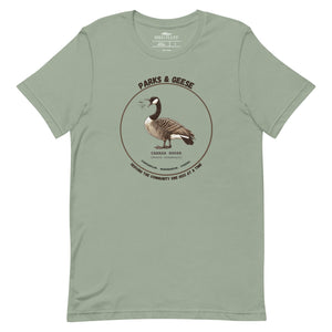 Unisex sage green bird shirt with a canada goose on the front and a park department theme.