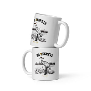 White 11-ounce mug featuring a play on the "No Regrets" tattoo that has the "R" crossed out to say "No Egrets" with a Whooping Crane below in a wetland setting.