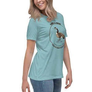 Women's relaxed fit light heather blue bird shirt with a canada goose on the front and a park department theme. Worn by a woman.
