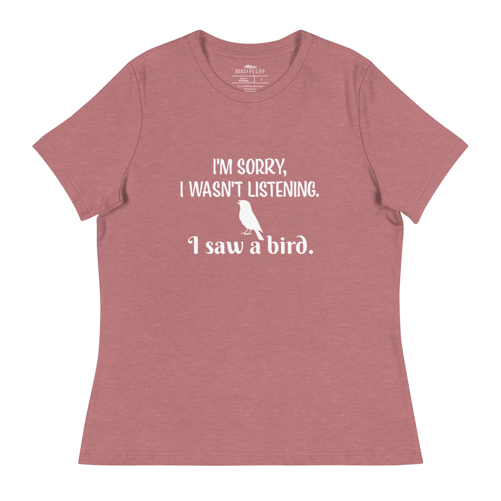 Heather mauve women's relaxed crew neck bird t-shirt with the words I'm sorry I wasn't listening, I saw a bird. And a graphic of a songbird.