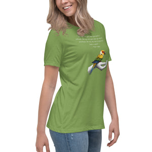 Women's relaxed fit green bird  t-shirt with a sun conure on a hand and a Mark Twain quote about a woman who keeps parrots. Worn by a woman.