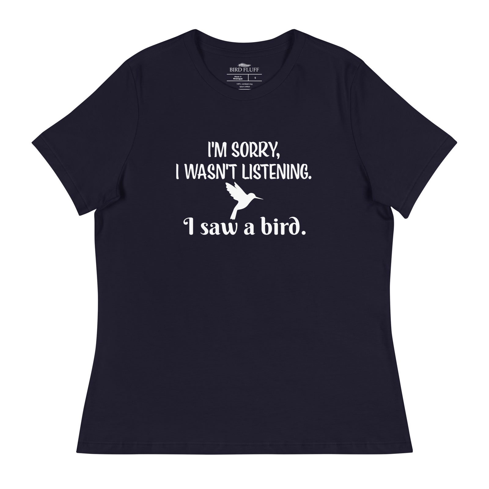 Navy blue women's relaxed crew neck bird t-shirt with the words I'm sorry I wasn't listening, I saw a bird. And a graphic of a hummingbird flying.