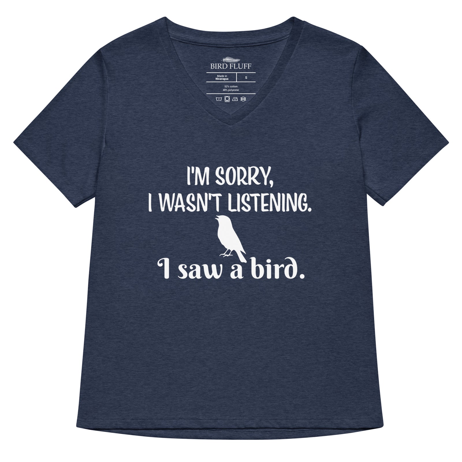 Heather navy women's relaxed v-neck bird t-shirt with the words I'm sorry I wasn't listening, I saw a bird. And a graphic of a songbird.