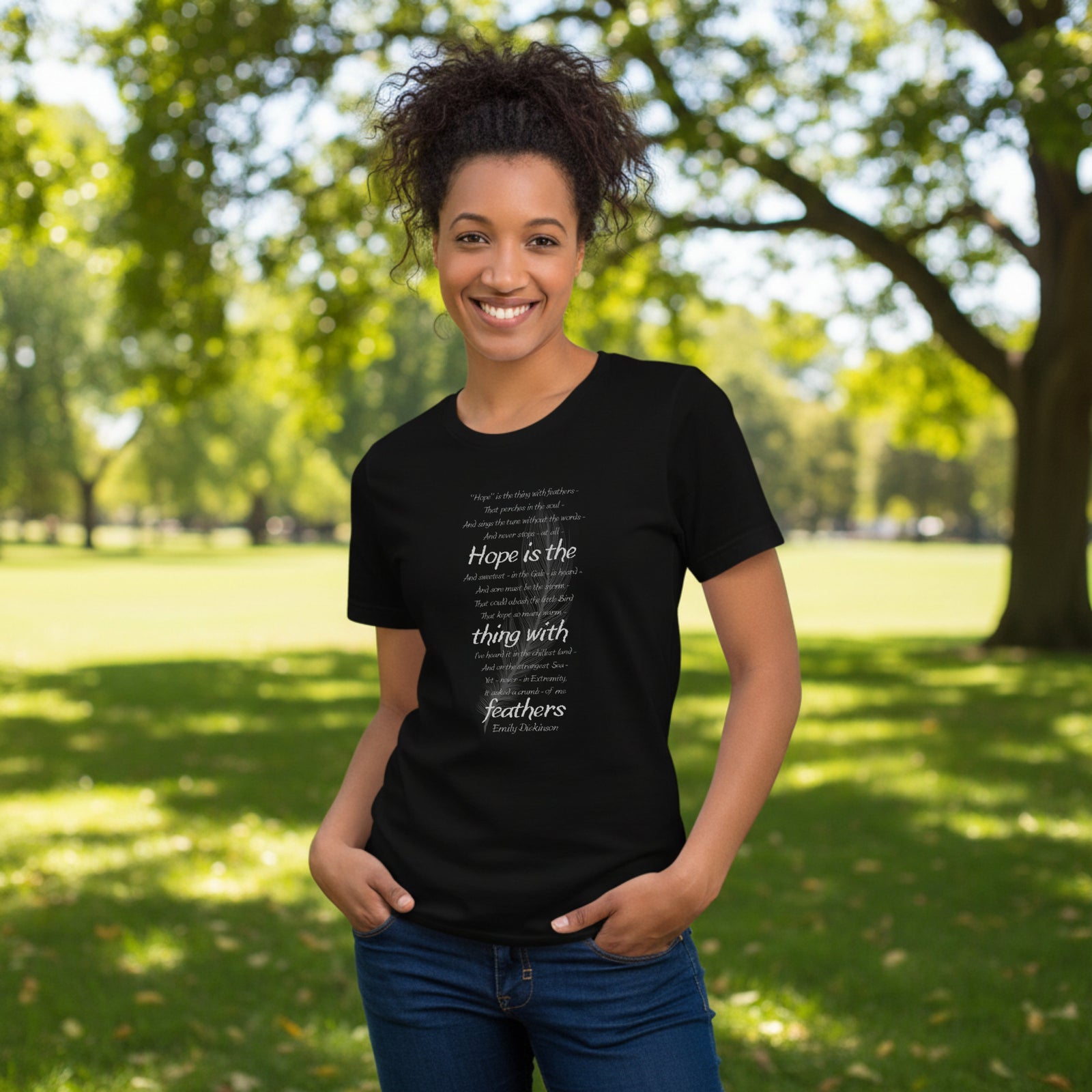 Black t-shirt with Emily Dickinson's Hope is the Thing with Feathers poem in white text.