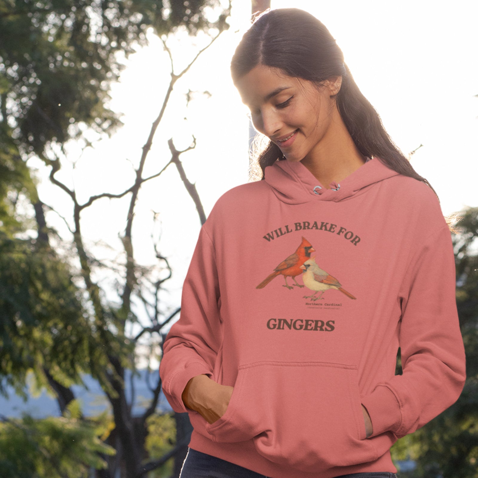 Unisex dusty rose bird hoodie with a male and female northern cardinal and the words, "Will Brake for Gingers" 
