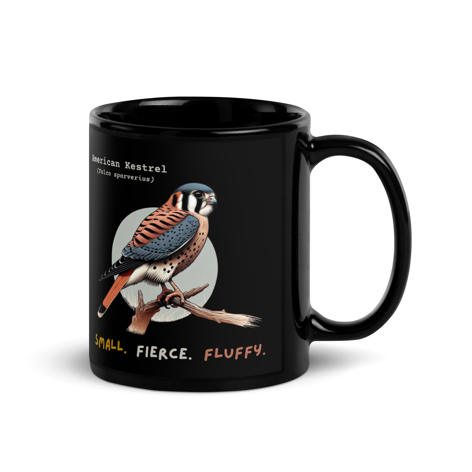 Black 11 oz ceramic mug with an American Kestrel design and the handle to the right.