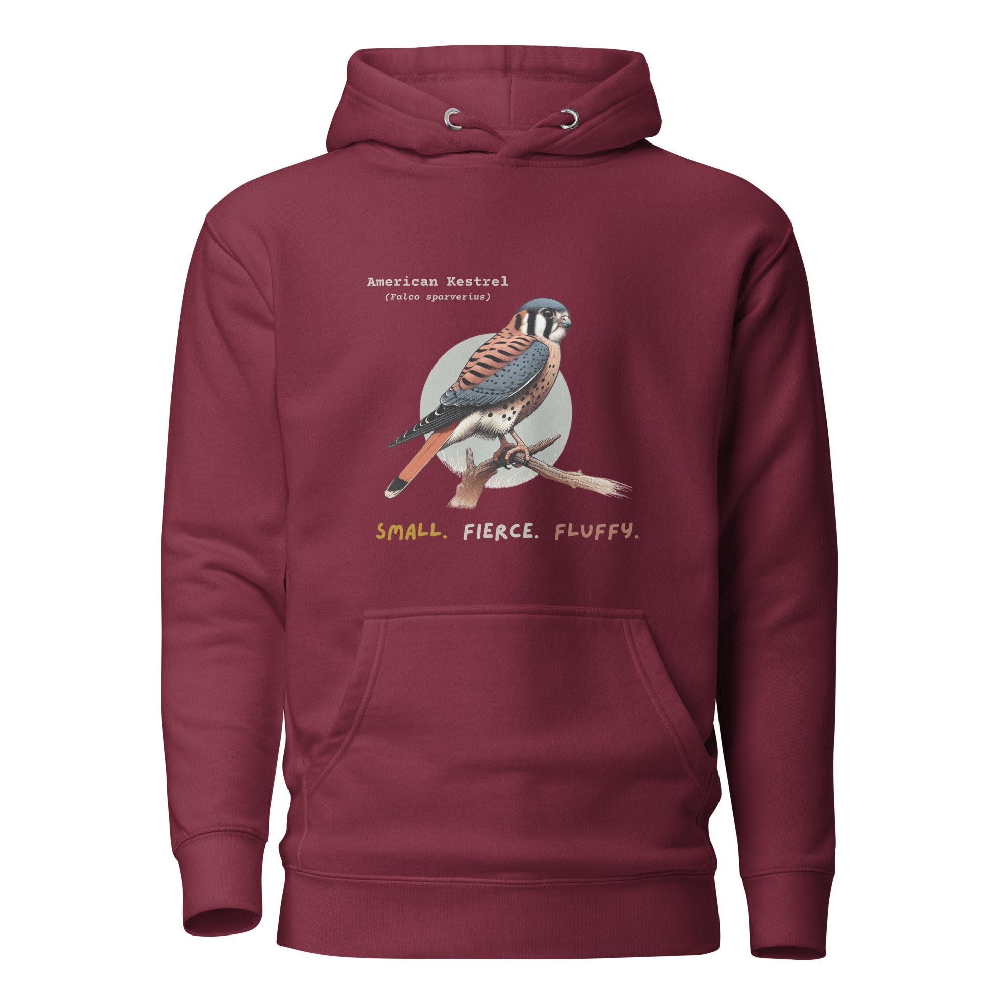 Maroon hooded unisex bird sweatshirt with the words, "Small. Fierce. Fluffy" below an illustration of an American Kestrel. 
