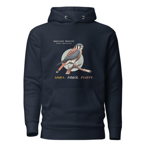 Navy hooded unisex bird sweatshirt with the words, "Small. Fierce. Fluffy" below an illustration of an American Kestrel. 