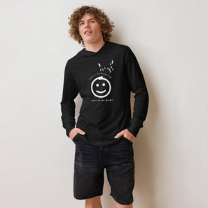 Black long sleeved and hooded tee with fun, "Easily Distracted, Mostly by Birds" saying on the front, with a smiley face looking up at a flock of birds. Worn by a man standing in front of a white background.