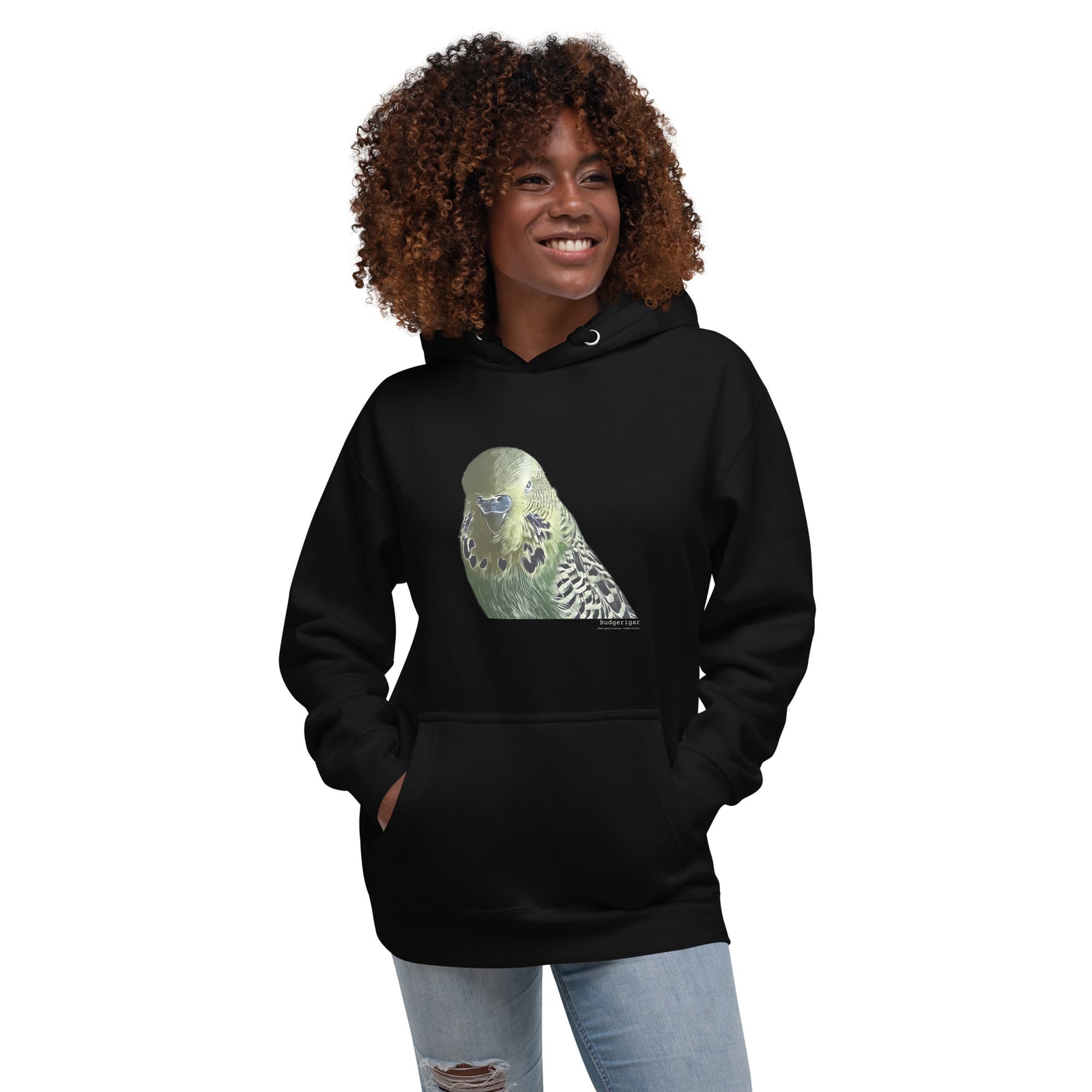 Black unisex bird hoodie with an illustrated and lifelike graphic of a green and yellow parakeet or budgie on the front. Below and to the right of the picture is the word Budgerigar and below that the scientific name in parenthesis in small print.