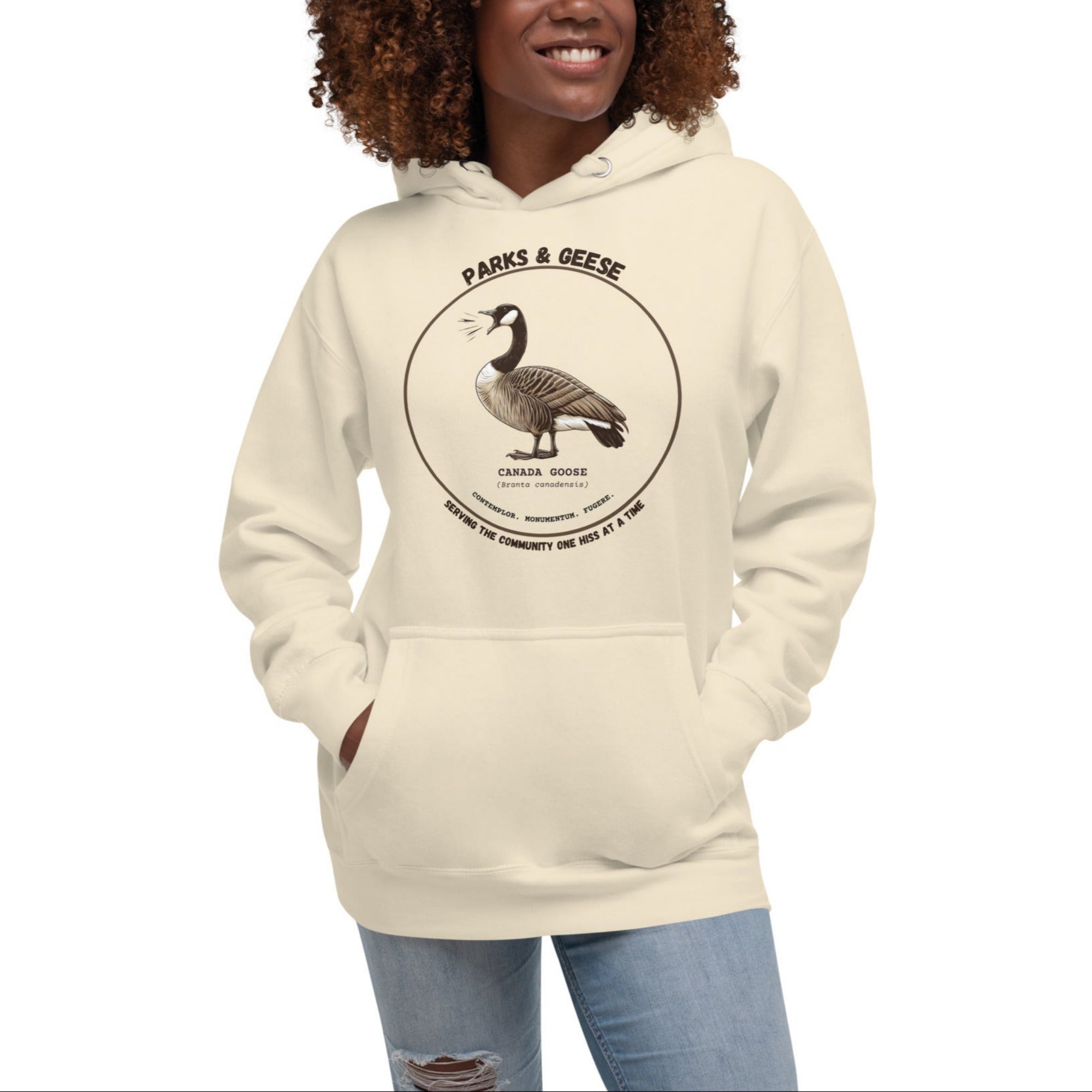 Unisex off white bird hoodie with a canada goose on the front and a park department theme. 