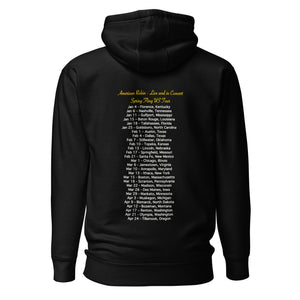 Concert style unisex hoodie in black; featuring an American Robin. View shows back of shirt which has dates and names of towns across America where you might hear an American Robin.