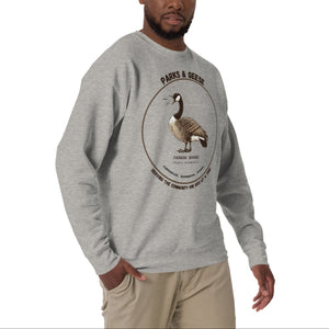 Unisex light heather gray bird sweatshirt with a canada goose on the front and a park department theme.  Worn by a man.