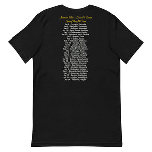 Concert style unisex fit tee in black; featuring an American Robin. View shows back of shirt which has dates and names of towns across America where you might hear an American Robin.
