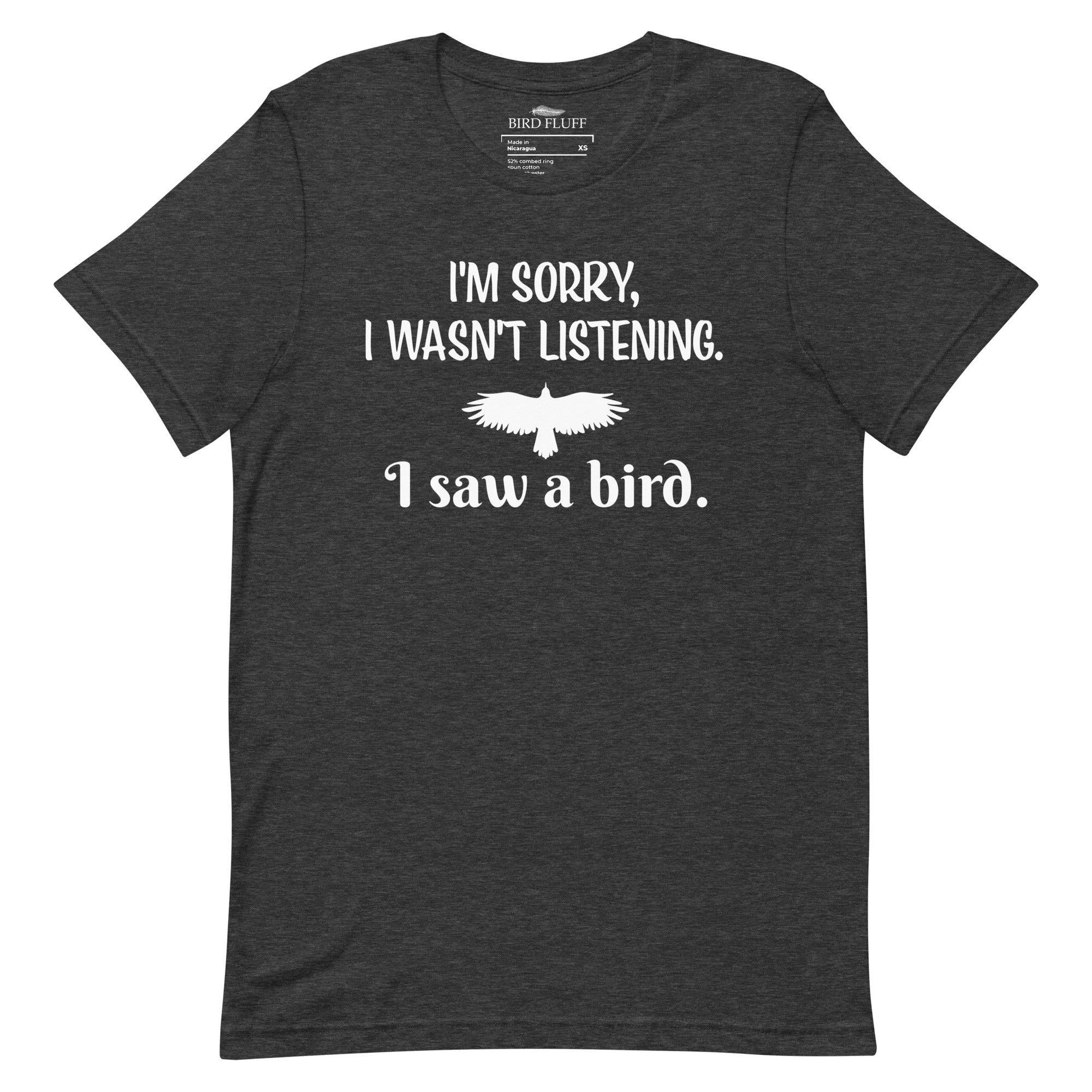 Dark heather gray bird t-shirt with the words I'm sorry I wasn't listening, I saw a bird. And a graphic of a bird flying. 