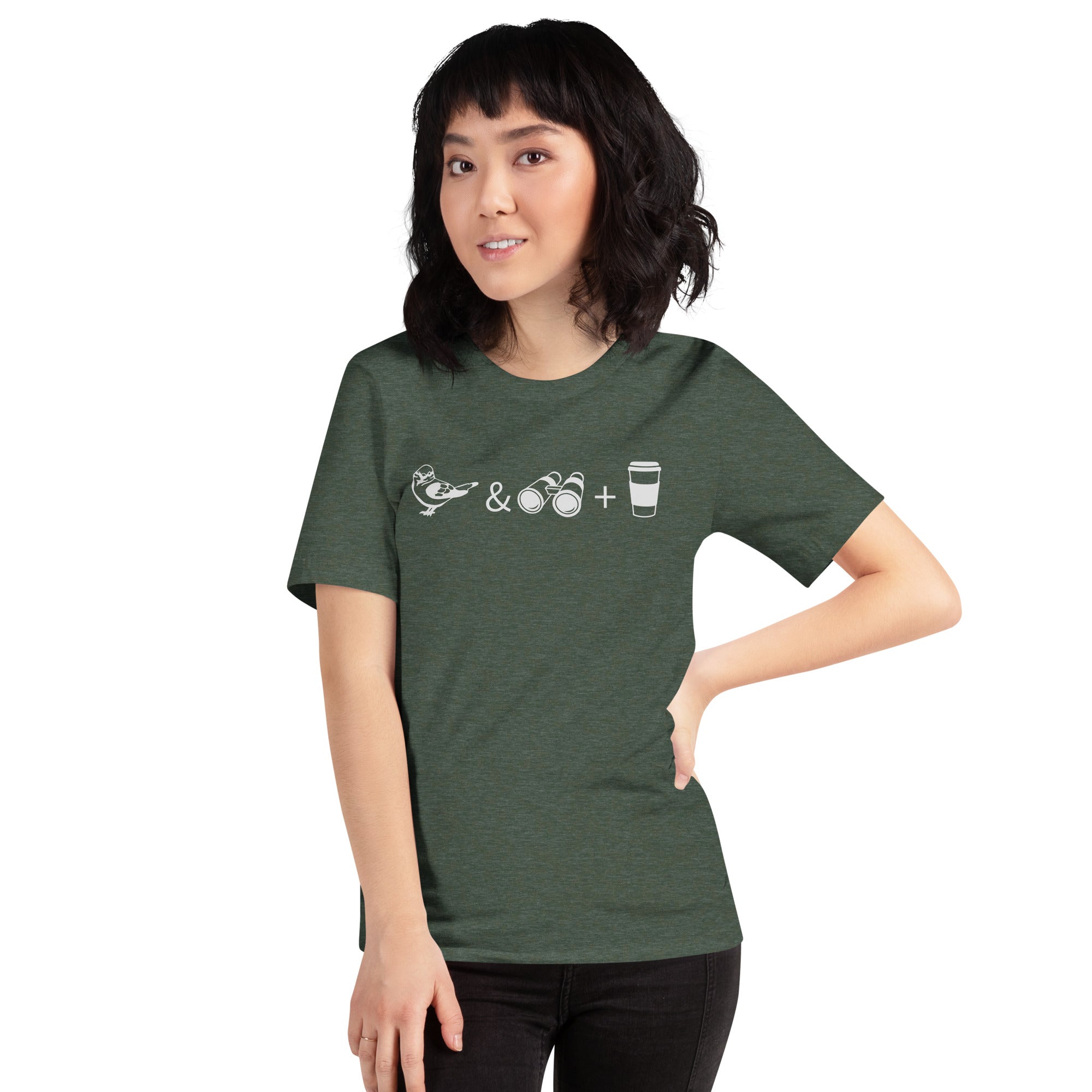 Forest green heather bird shirt with a bird, binoculars and cup of coffee. Worn by a woman.