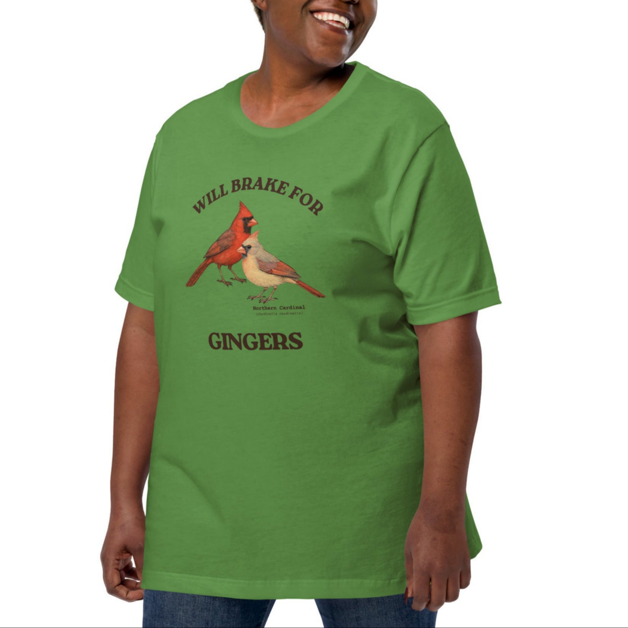 Leaf green bird shirt with a male and female northern cardinal and the words, "Will Brake for Gingers" worn by a woman.