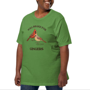 Leaf green bird shirt with a male and female northern cardinal and the words, "Will Brake for Gingers" worn by a woman.