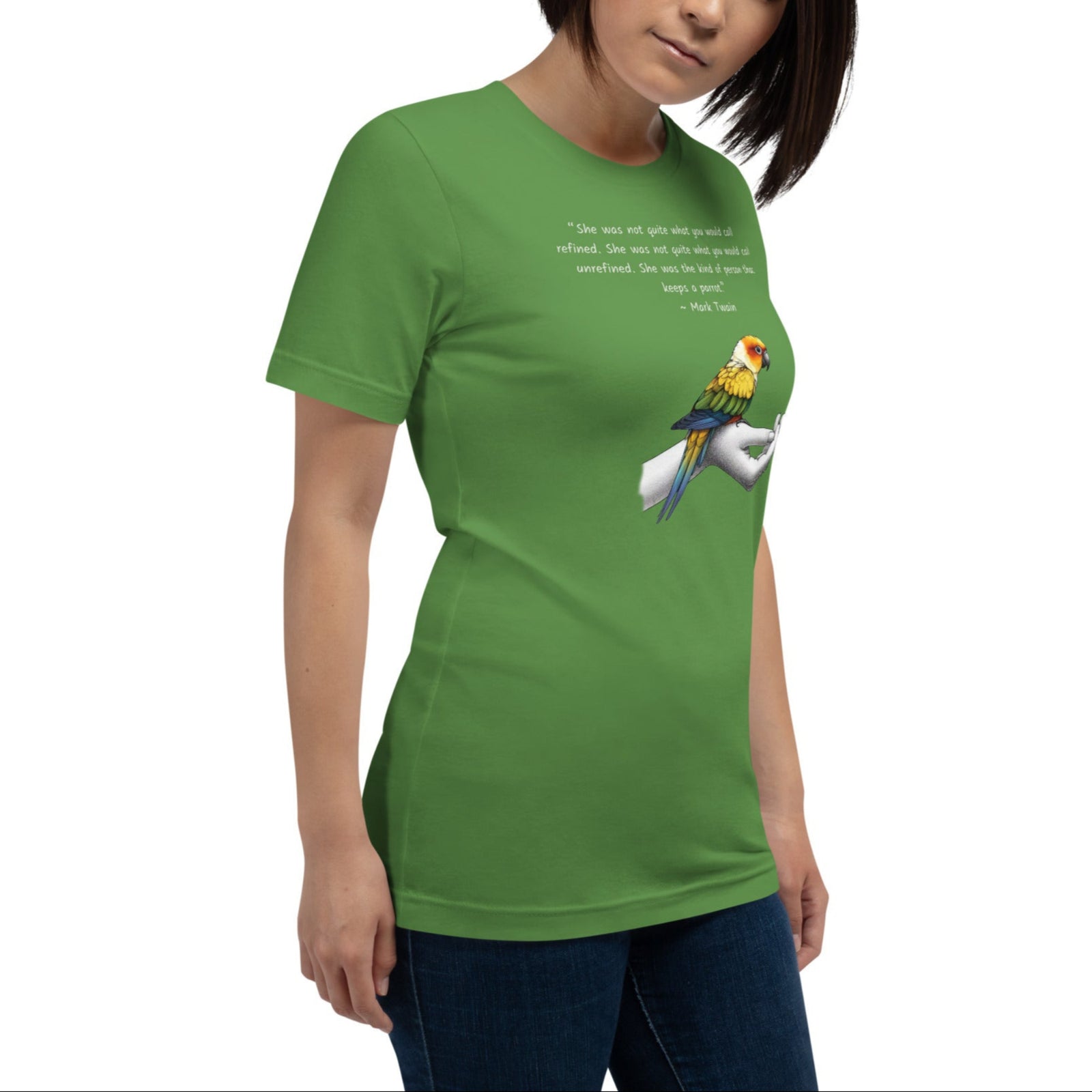 Unisex green t-shirt with a sun conure on a hand and a Mark Twain quote about a woman who keeps parrots.