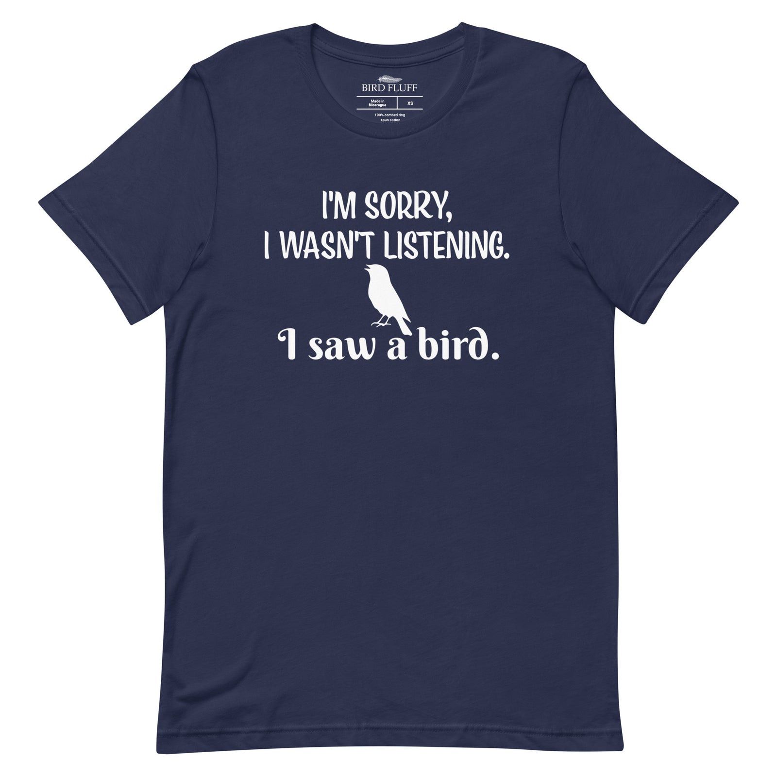 Navy blue unisex bird t-shirt with the words I'm sorry I wasn't listening, I saw a bird. And a graphic of a songbird.