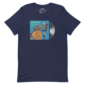 Concert style unisex fit tee in navy blue; featuring an American Robin. View shows back of shirts which has dates and names of towns across America where you might hear an American Robin.