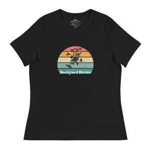 Black women's bird shirt with a retro sun design outlining a bird feeder with the words Backyard Birder.