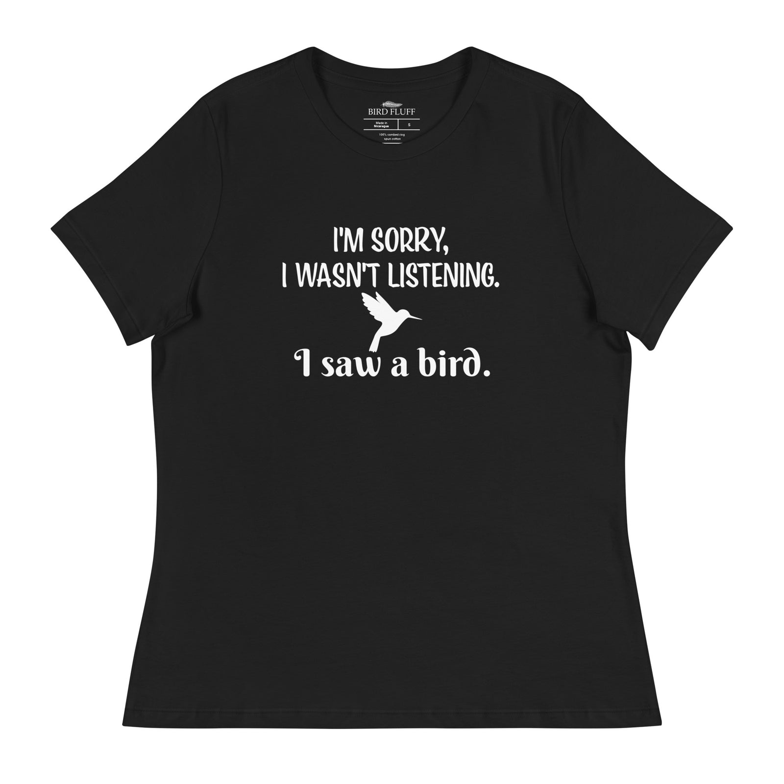 Black women's relaxed crew neck bird t-shirt with the words I'm sorry I wasn't listening, I saw a bird. And a graphic of a hummingbird flying. 