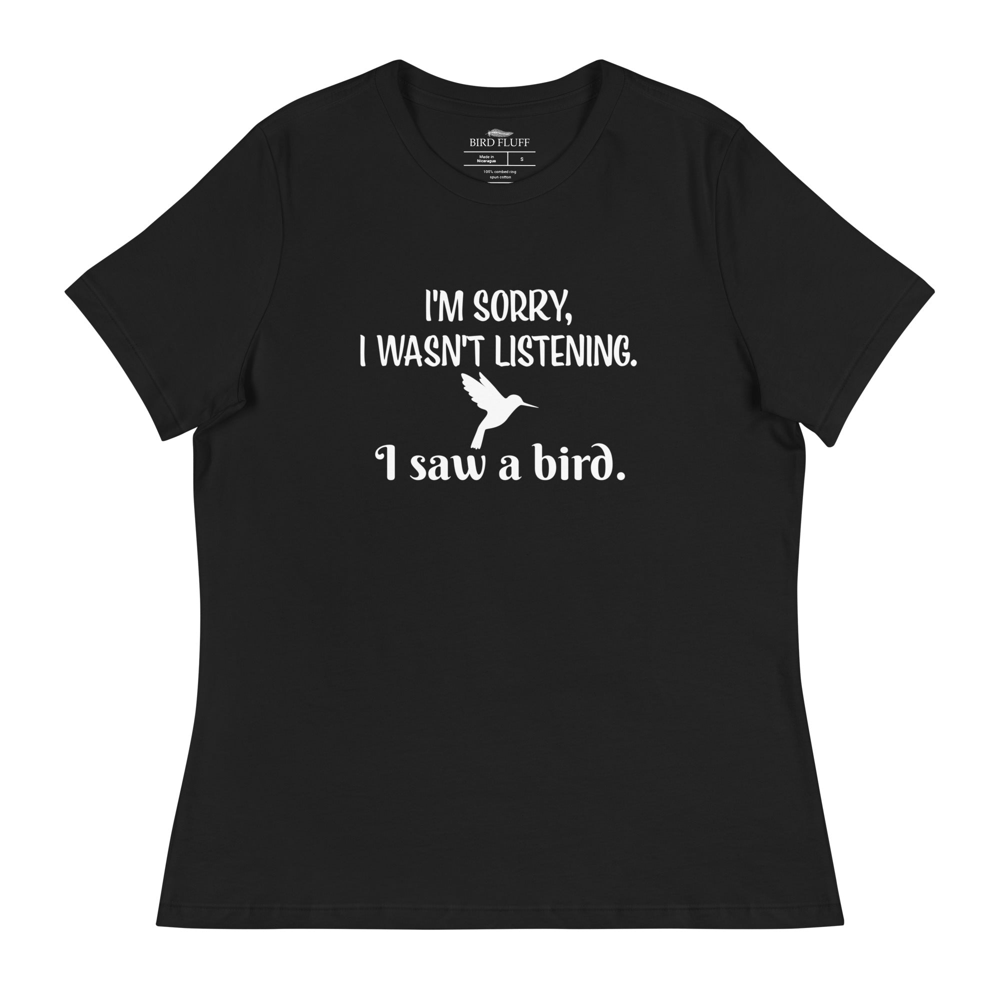 Black women's relaxed crew neck bird t-shirt with the words I'm sorry I wasn't listening, I saw a bird. And a graphic of a hummingbird flying. 