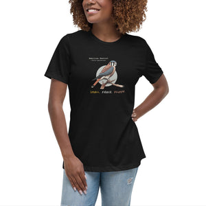 A black women's bird shirt with the words, "Small. Fierce. Fluffy" below an illustration of an American Kestrel. Worn by a woman.
