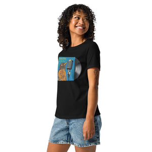 Concert style women's relaxed fit tee in black; featuring an American Robin. Shown being worn by a woman.