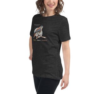 A dark heather gray women's bird shirt with the words, "Small. Fierce. Fluffy" below an illustration of an American Kestrel. Worn by a woman.