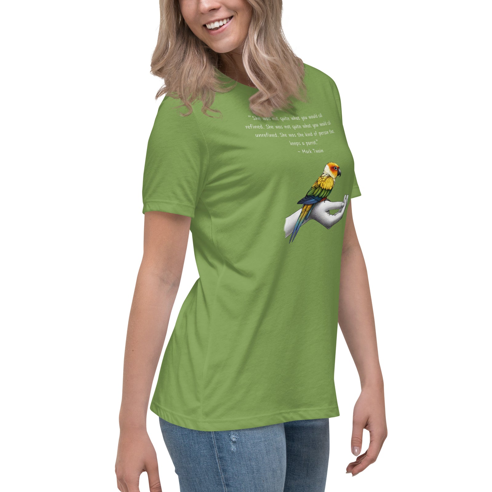 Women's relaxed fit green bird  t-shirt with a sun conure on a hand and a Mark Twain quote about a woman who keeps parrots.