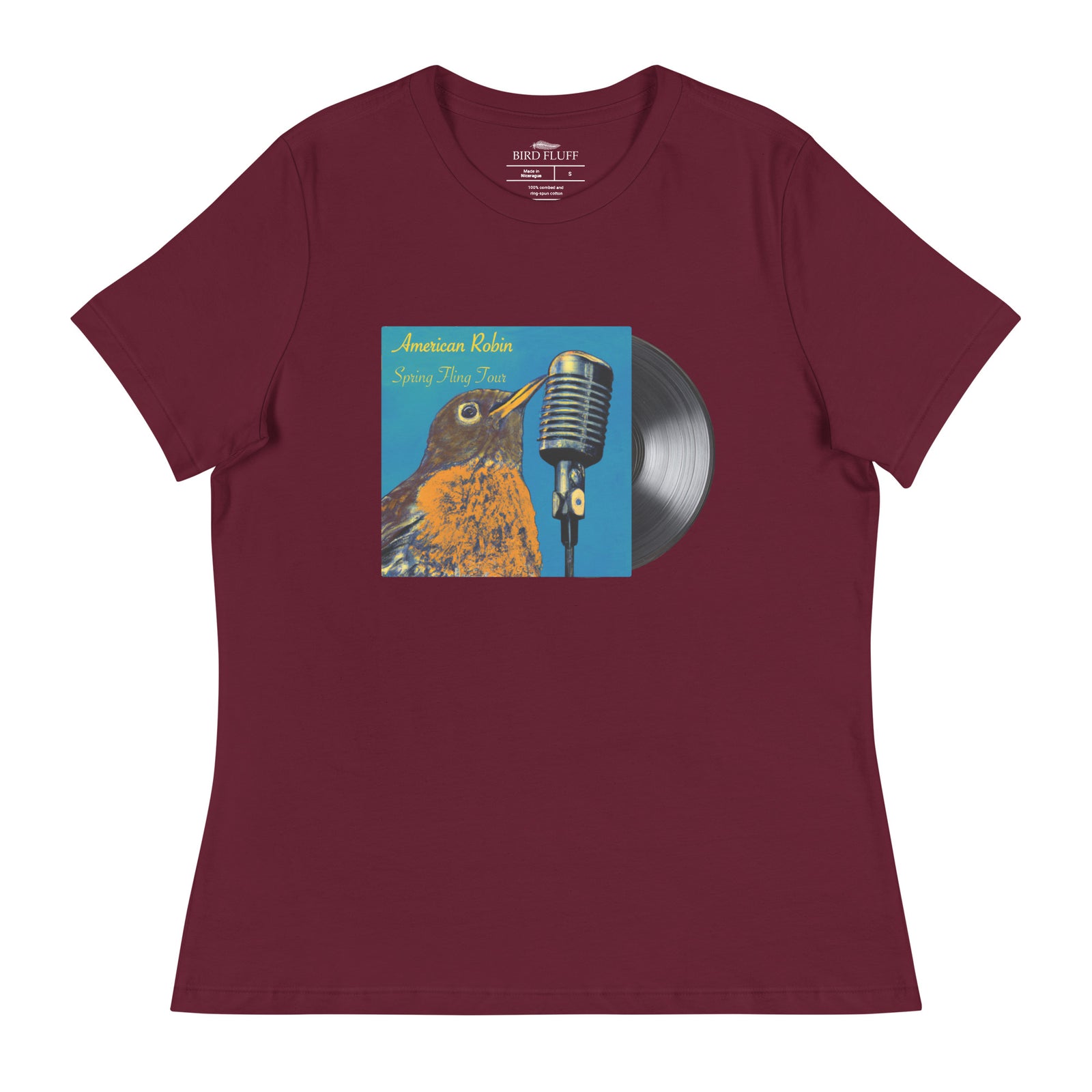Concert style women's relaxed fit tee in maroon; featuring an American Robin. 