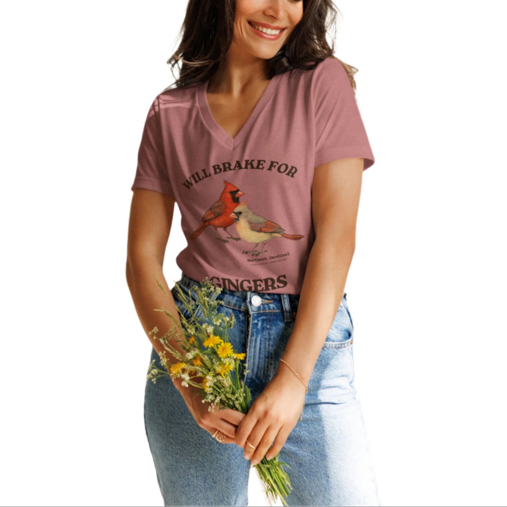 Heather mauve women's relaxed fit v-neck bird shirt with a male and female northern cardinal and the words, "Will Brake for Gingers" worn by a woman.