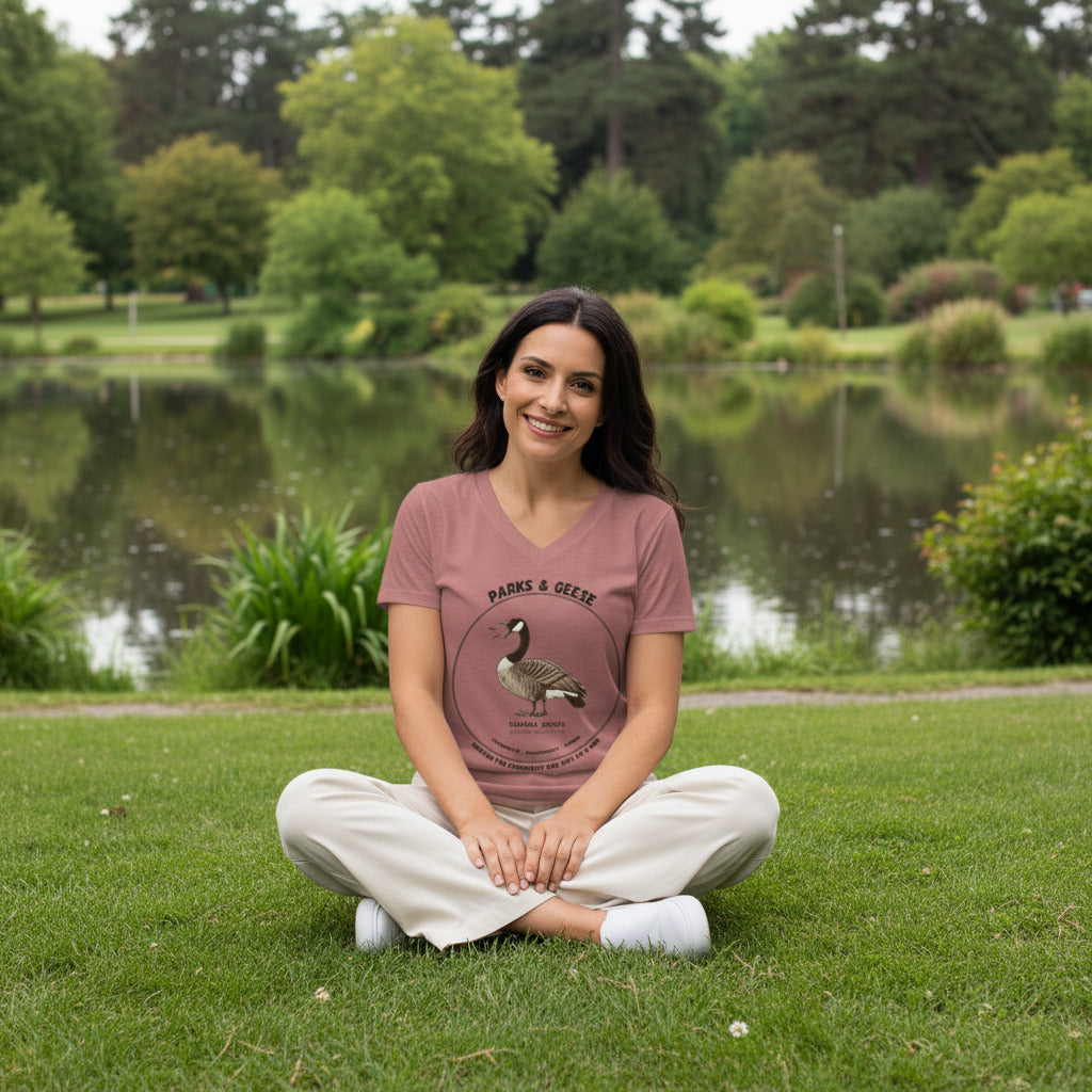 Turquoise women's relaxed v-neck bird t-shirt with a canada goose on the front and a park department theme. 